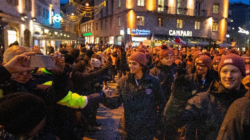 Athletes marching through fans